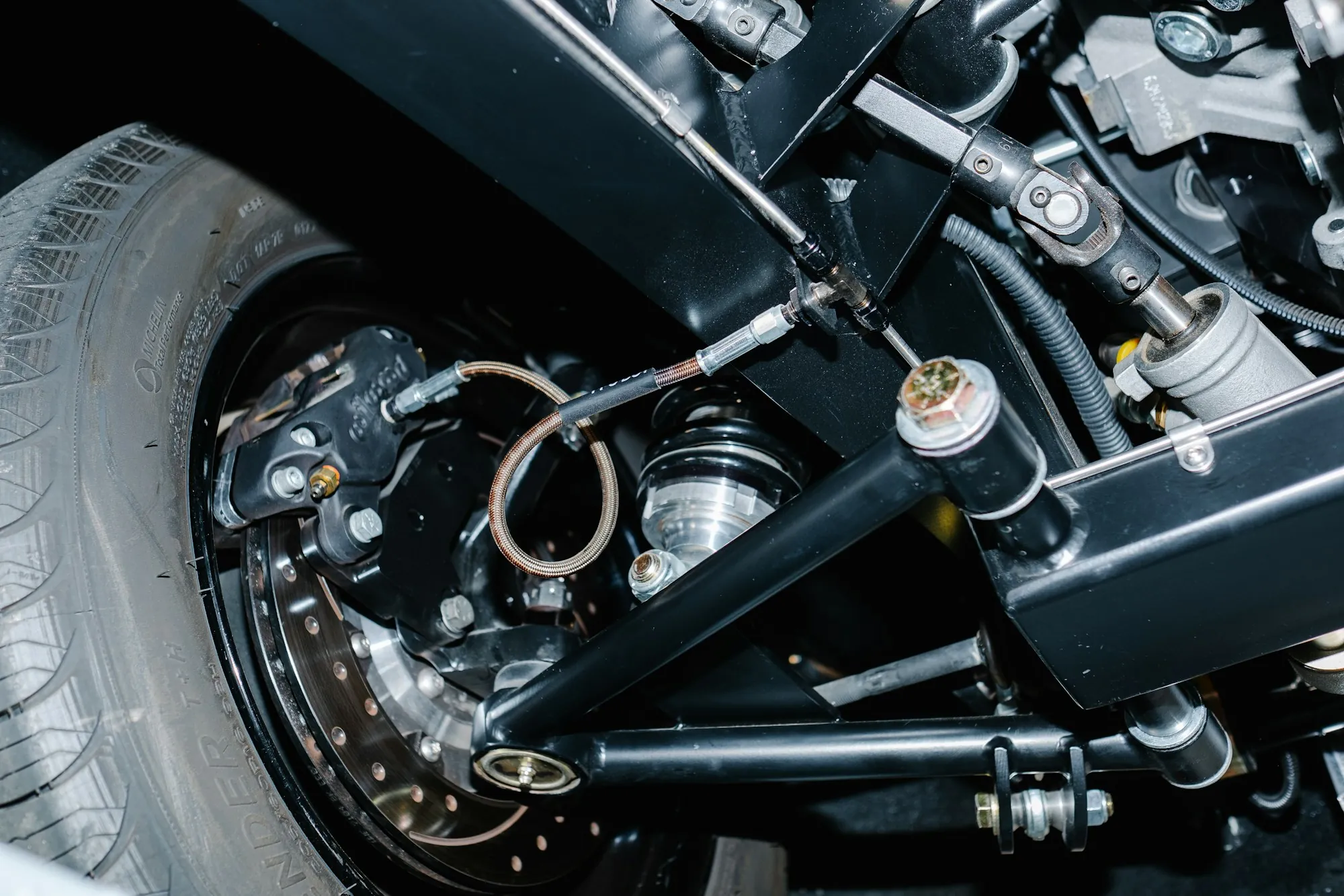 Close-up of a coil spring and strut assembly